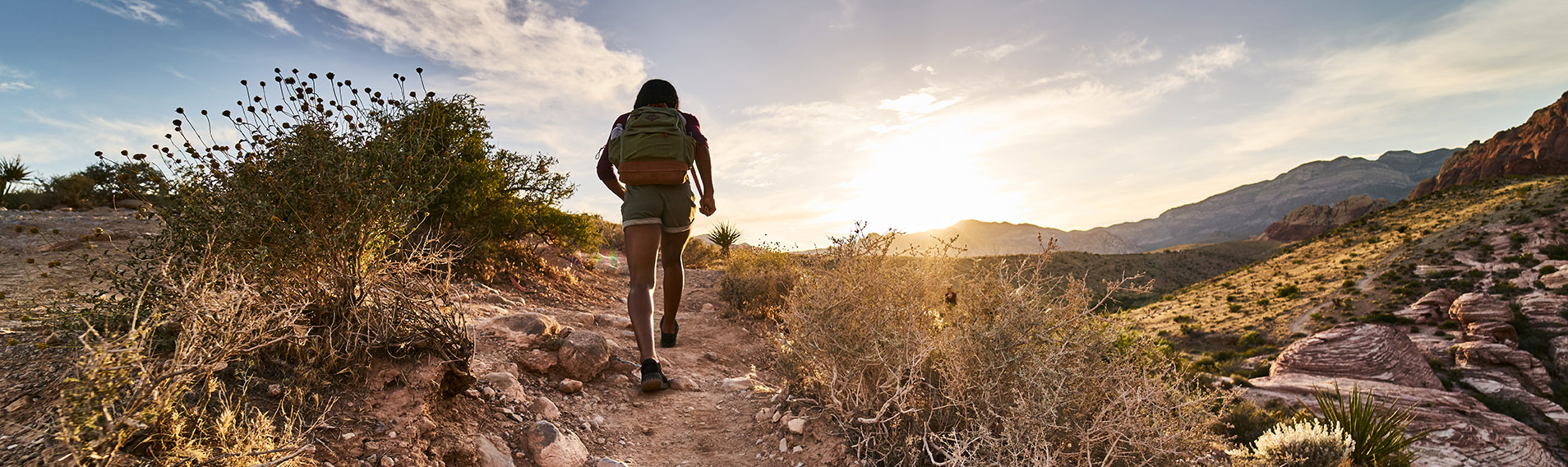 woman hiking sunrise